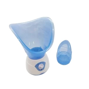 Gezichts- en neusstoombad met blauwe kap voor effectieve huidverzorging en sinusverlichting, wit met draaiknop.