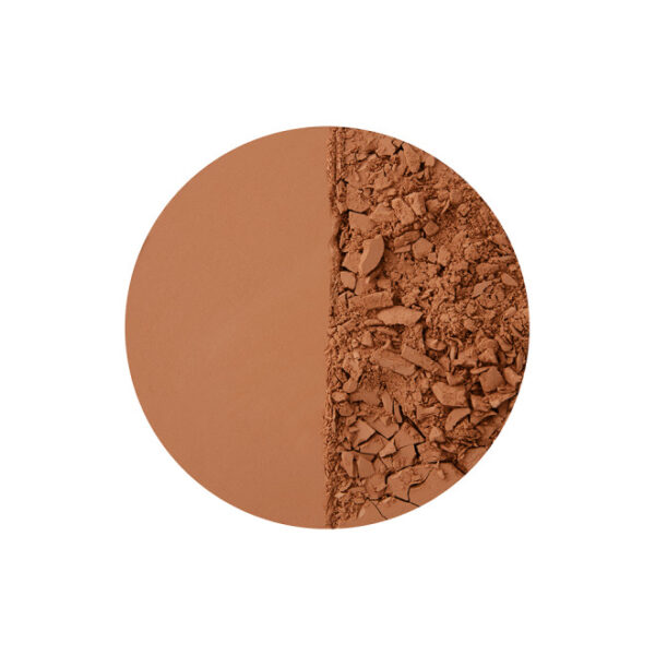 Gebroken en compacte bronzer op een witte achtergrond, halve cirkel textuurcontrast.