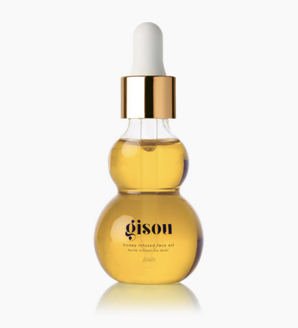 Gouden Gisou gezichtsolie flesje met honingextract en pipet, voor een stralende huidverzorging.