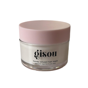 Gisou honing haarmasker in een roze dekselpotje voor intensieve haarverzorging. Perfect voor glans en voeding.