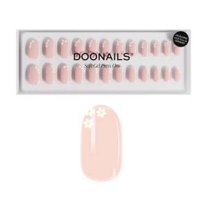 Alt-tekst: Doonails zachte gel nepnagels in nude tint met bloemdesign, verpakt in een elegante doos.