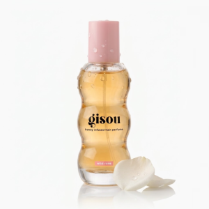 Gisou honinggeïnfundeerde haarparfum met wilde rozen geur, in een elegante fles met druppels. Perfect voor geur en verzorging.
