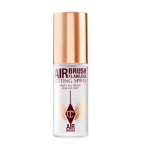 Instelling spray met gouden dop en tekst Airbrush Flawless Setting Spray: Party All Night, Stay All Day.