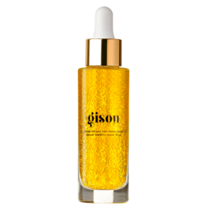 Honing-infused haarserum in elegante fles met gouden dop, perfecte verzorging voor glanzend en gezond haar.