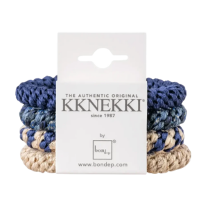 Kknekki haarbanden in blauw en beige tonen, verpakt en klaar voor gebruik. Duurzaam en stijlvol sinds 1987.