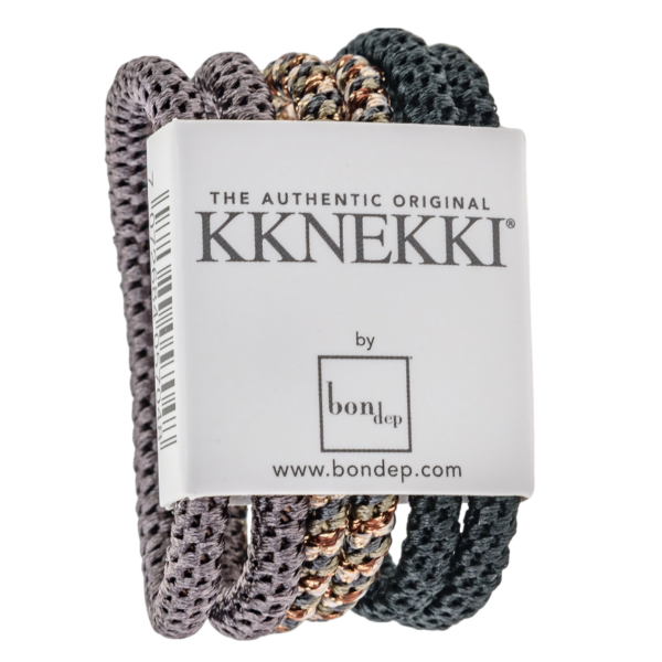 Drie kleurrijke Kknekki haarbanden van Bon Dep in verpakking.