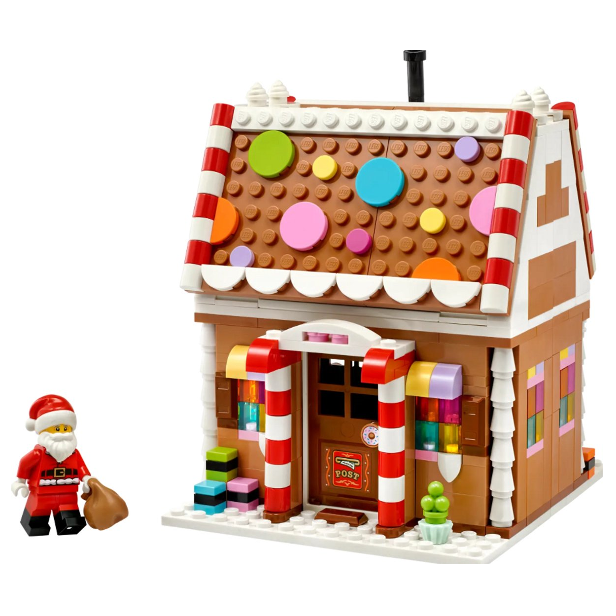LEGO peperkoekhuis met kerstman minifiguur en kleurrijke details. Ideaal voor kerstdecoratie en creatief speelgoed.
