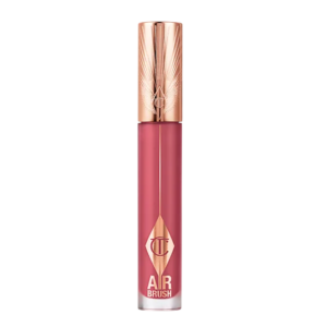 Roze lipgloss met gouden dop, merkloos ontwerp. Premium make-up product verpakking.