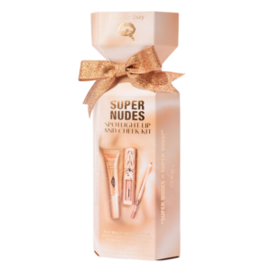 Super Nudes Spotlight Lip and Cheek Kit met gouden strik voor feestelijke make-upcadeaubox.