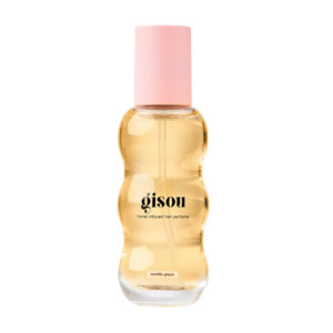 Flesje Gisou honing haarparfum met roze dop en golvende vorm, ideaal voor geurige en verzorgde lokken.