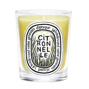 Gele Diptyque Citronnelle geurkaars in glas met label, perfect voor een verfrissende zomerse sfeer.
