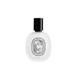 Luxe Diptyque parfumfles met zwart-witte vintage stijl en verfijnde bloemenaccen. Perfect cadeau voor geur liefhebbers.