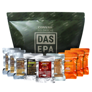 Alt-tekst: Diverse voedingspakketten van CONVAR Feldküche, inclusief koffie, salami en multivitaminen voor outdoor avontuur.