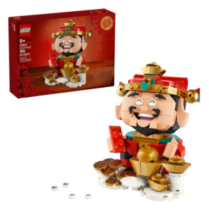 LEGO set van een vrolijke Dorst Master met gouden munten, ideaal voor creatief spelen en verzamelen. Geschikt voor kinderen 9+.