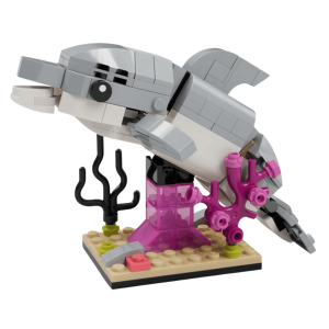 LEGO-dolfijnmodel met kleurrijke koraalrif en basis in zeeomgeving, ideaal voor creatieve spelsessies.